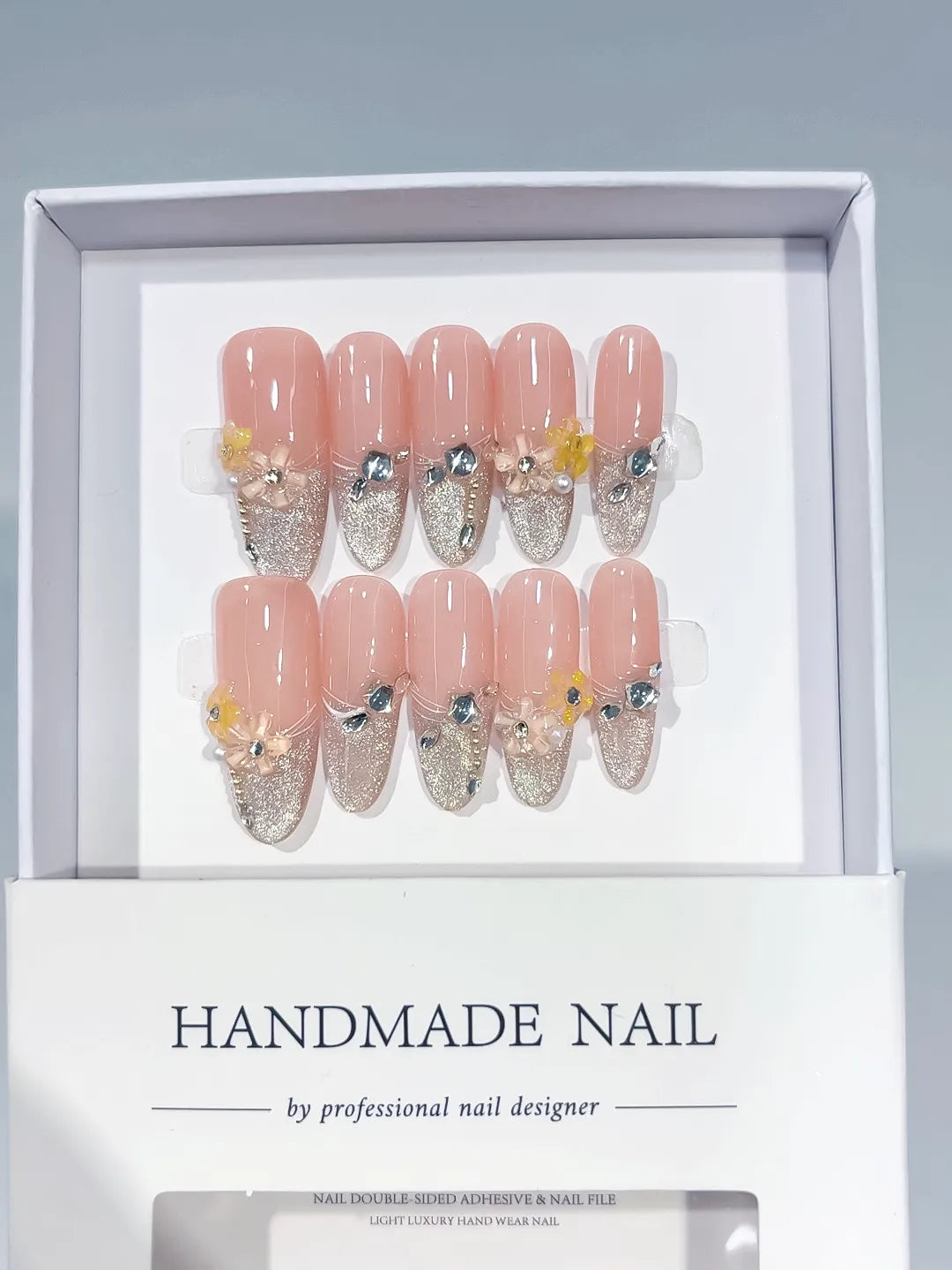 Nude Silver Yellow Glitter Flower Rhinestone press on nails angled view