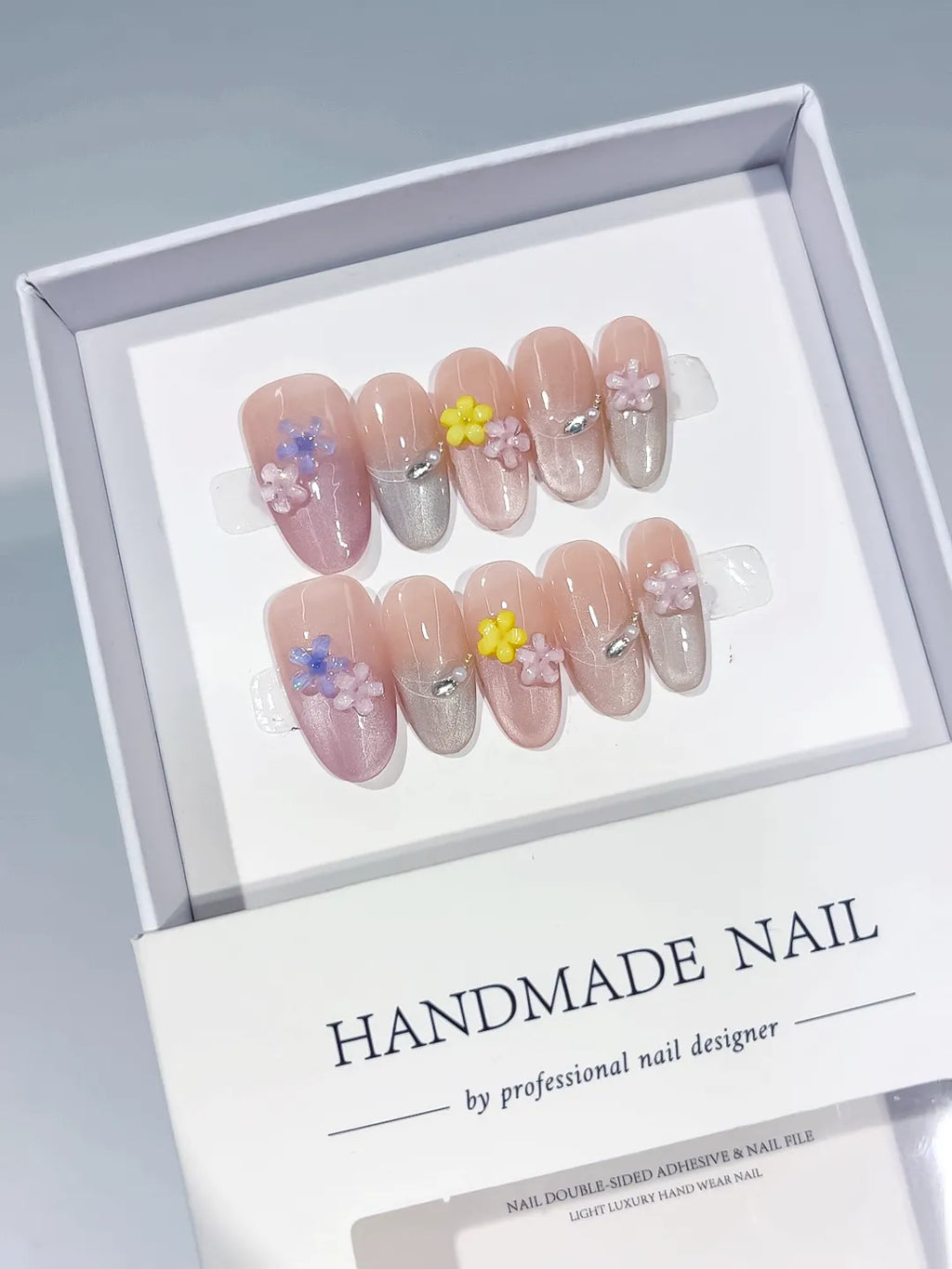 Pink Silver Yellow Purple Metallic Flower Rhinestone press on nails angled view