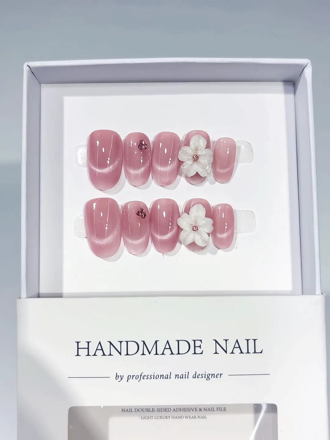 Pink Metallic Flower press on nails angled view