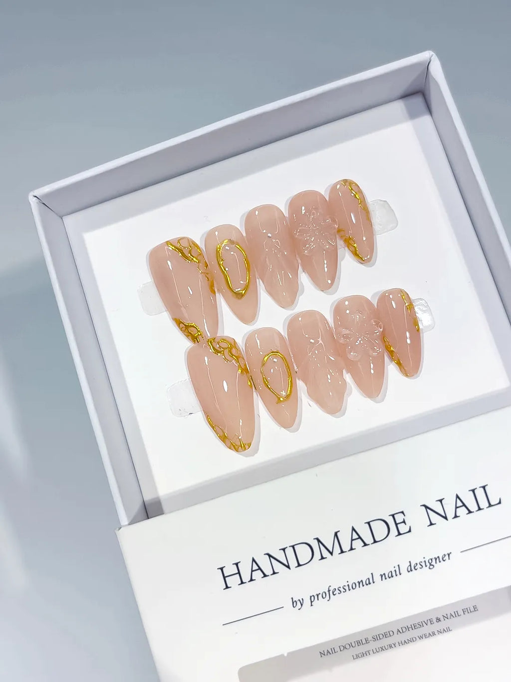 Nude Gold Metallic Gold Outline Pearl press on nails angled view