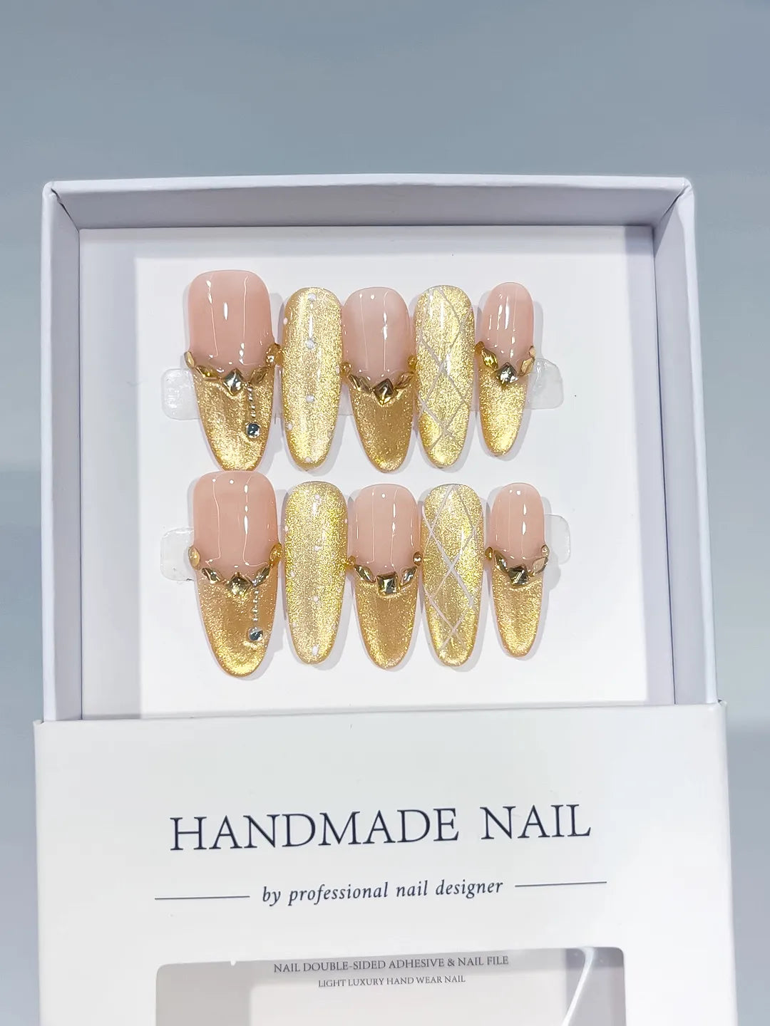 Nude Gold Metallic Heart Rhinestone press on nails angled view