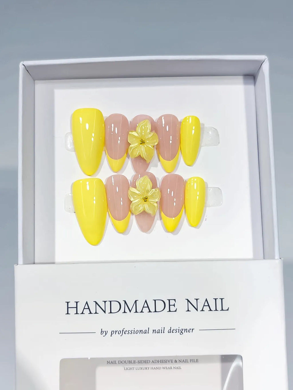 Yellow Nude French tip Flower press on nails angled view