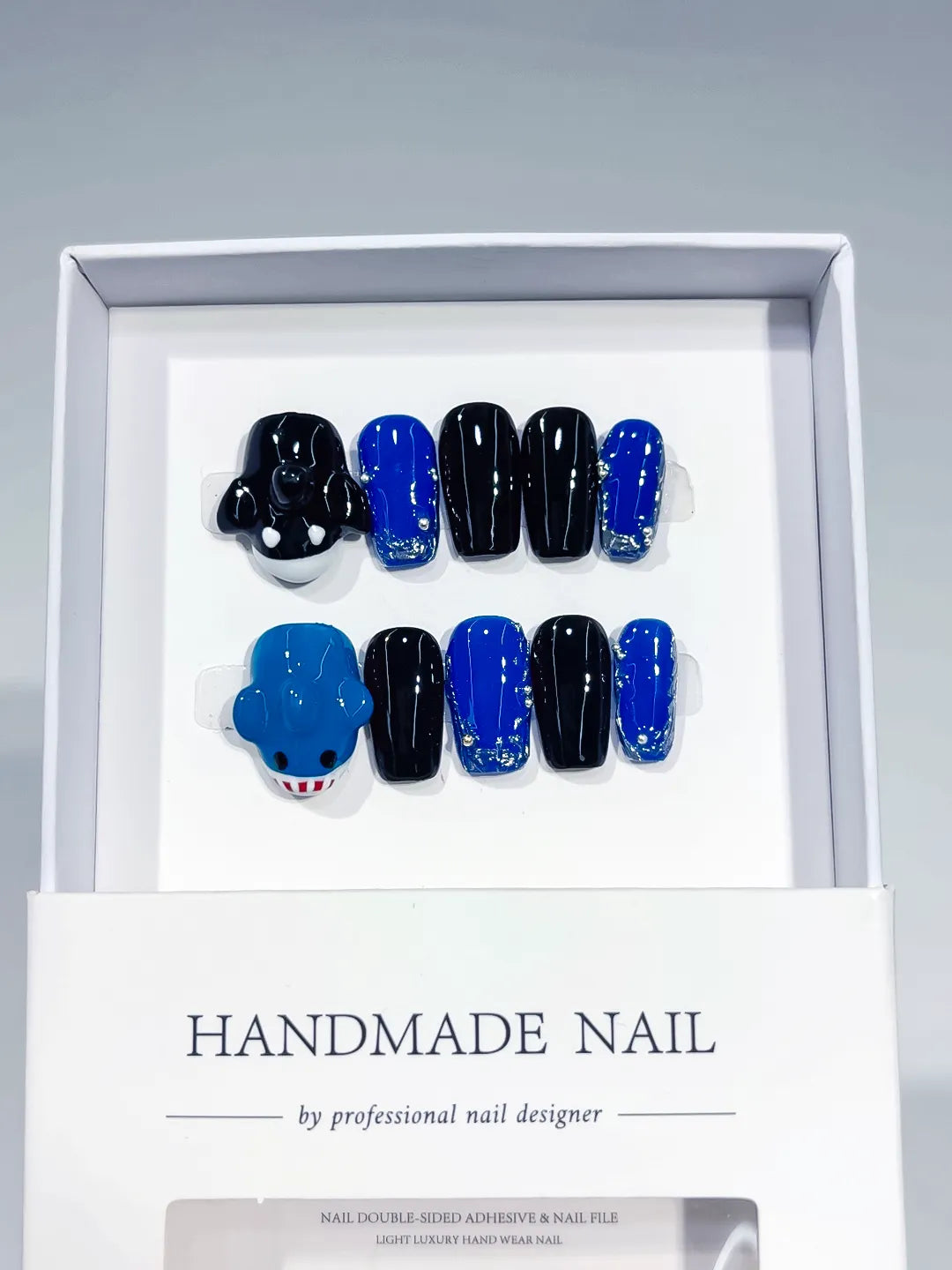 Black Blue Solid color Bear Glitter press on nails angled view
