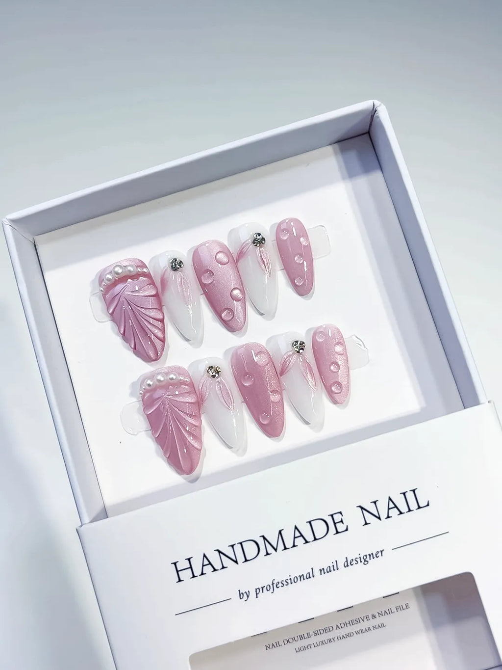 Pink White Holographic Embossed Pearl Rhinestone press on nails angled view