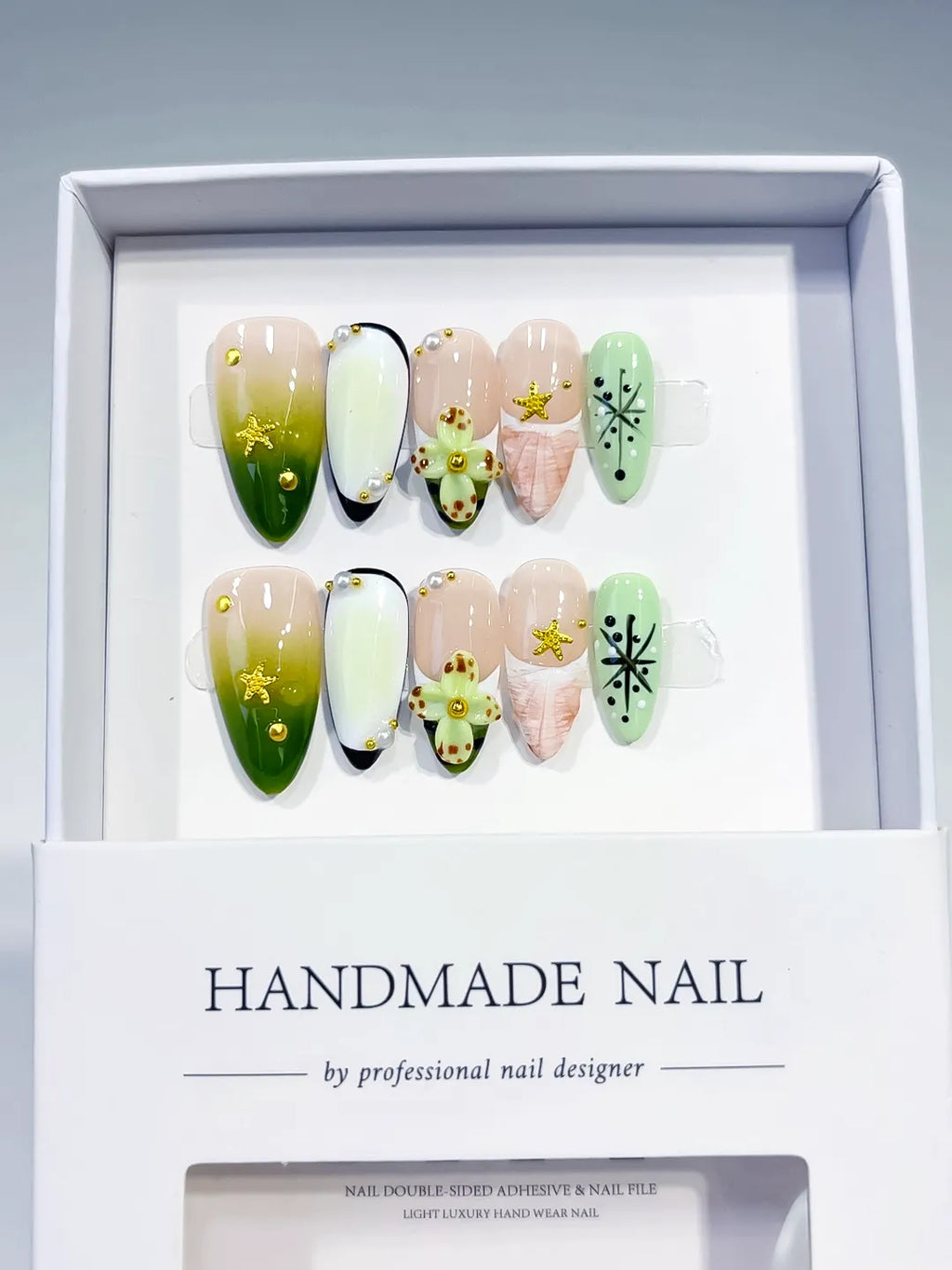 Green Nude Black Abstract Flower Star press on nails angled view