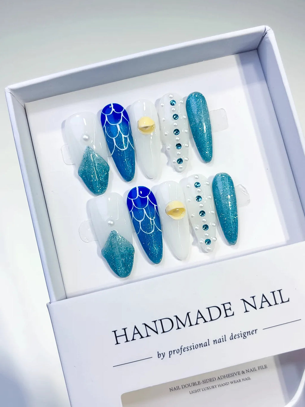 White Blue Glitter Shell Pearl press on nails angled view