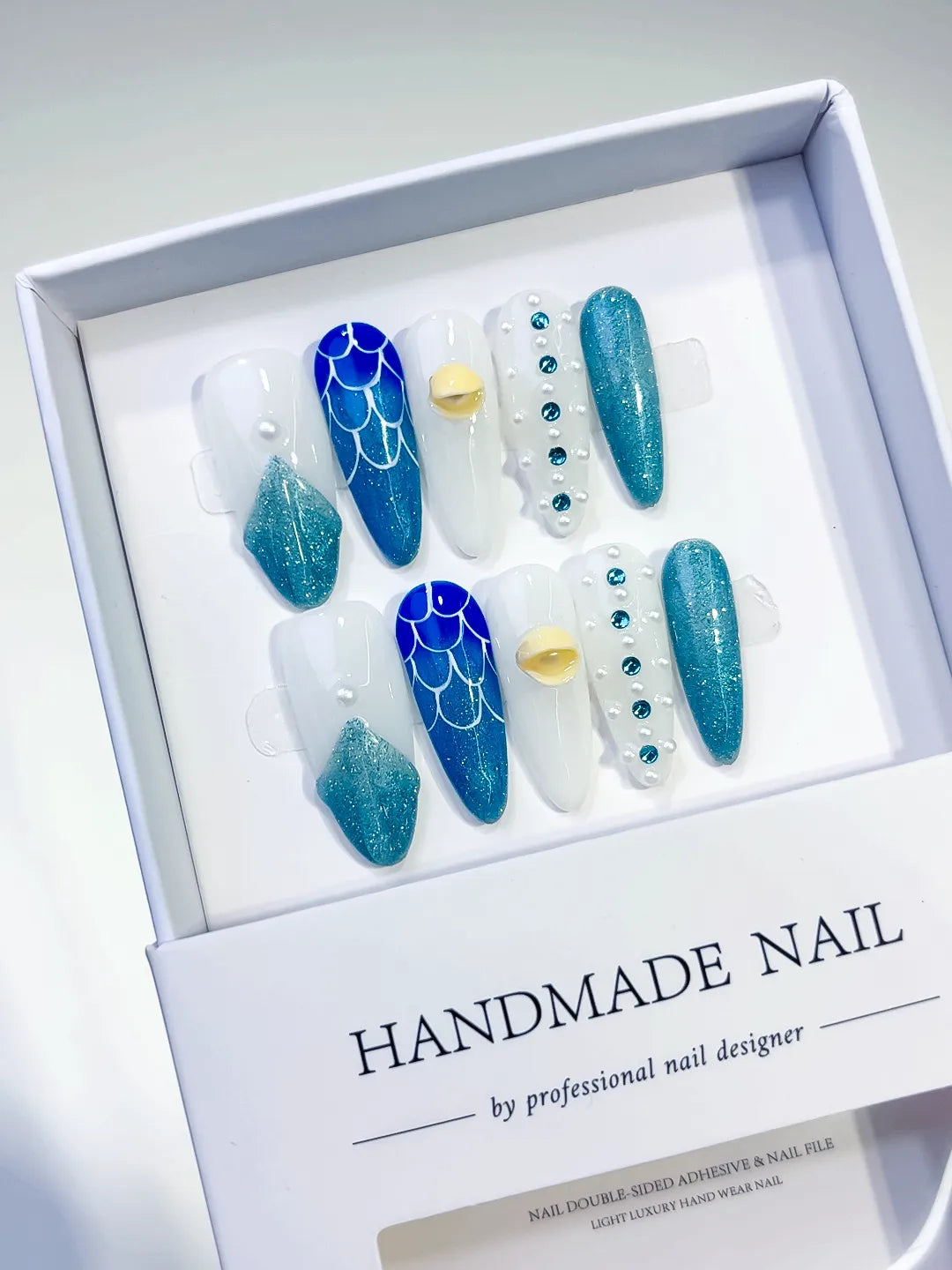 White Blue Glitter Shell Pearl press on nails angled view