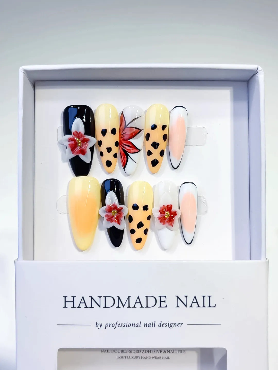 Black Yellow White Red Abstract Flower Animal Print press on nails full set view