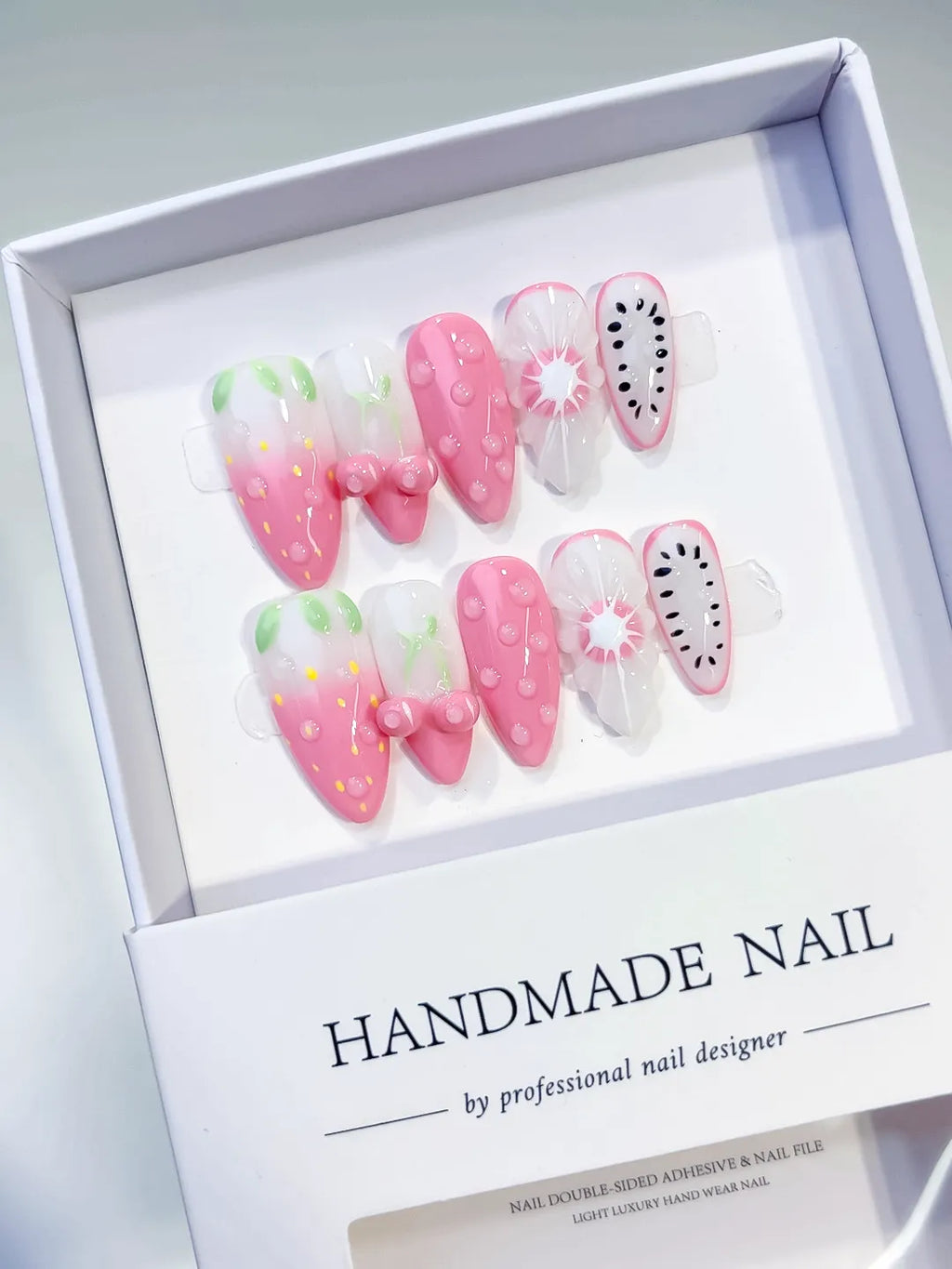 Pink White Green Abstract Bow Fruit press on nails angled view