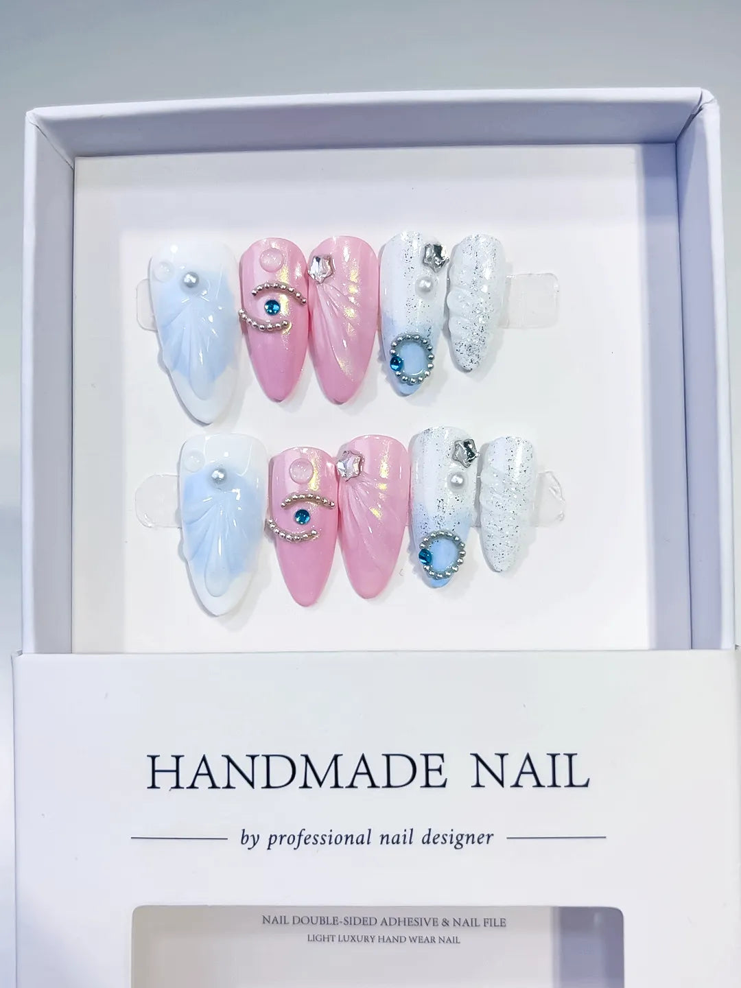 Pink White Blue Holographic Rhinestone Embossed press on nails close up