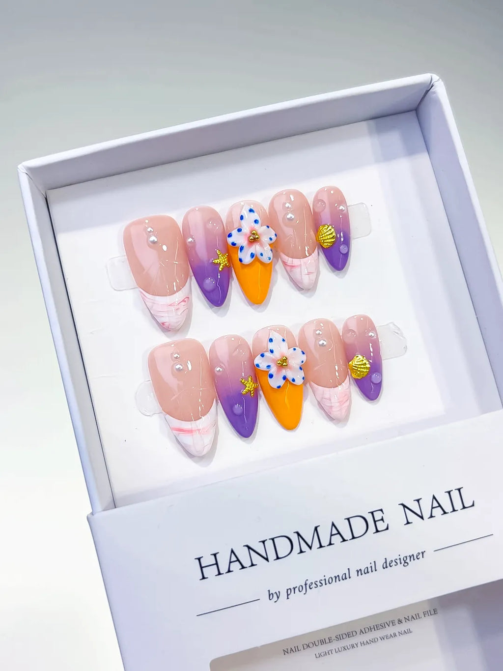 Nude Purple Orange Abstract Flower Star press on nails angled view