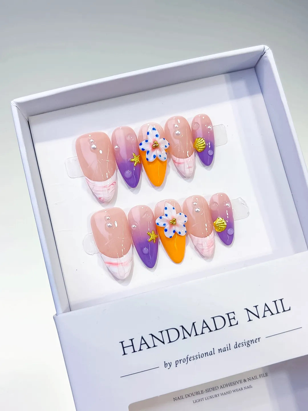 Nude Purple Orange Abstract Flower Star press on nails angled view