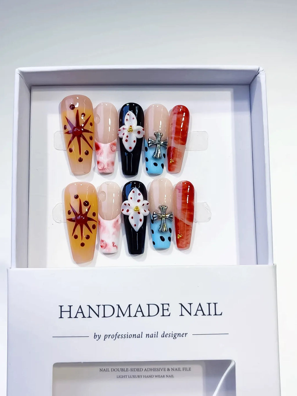 Nude Black Blue Orange Abstract Flower Cross press on nails detail view