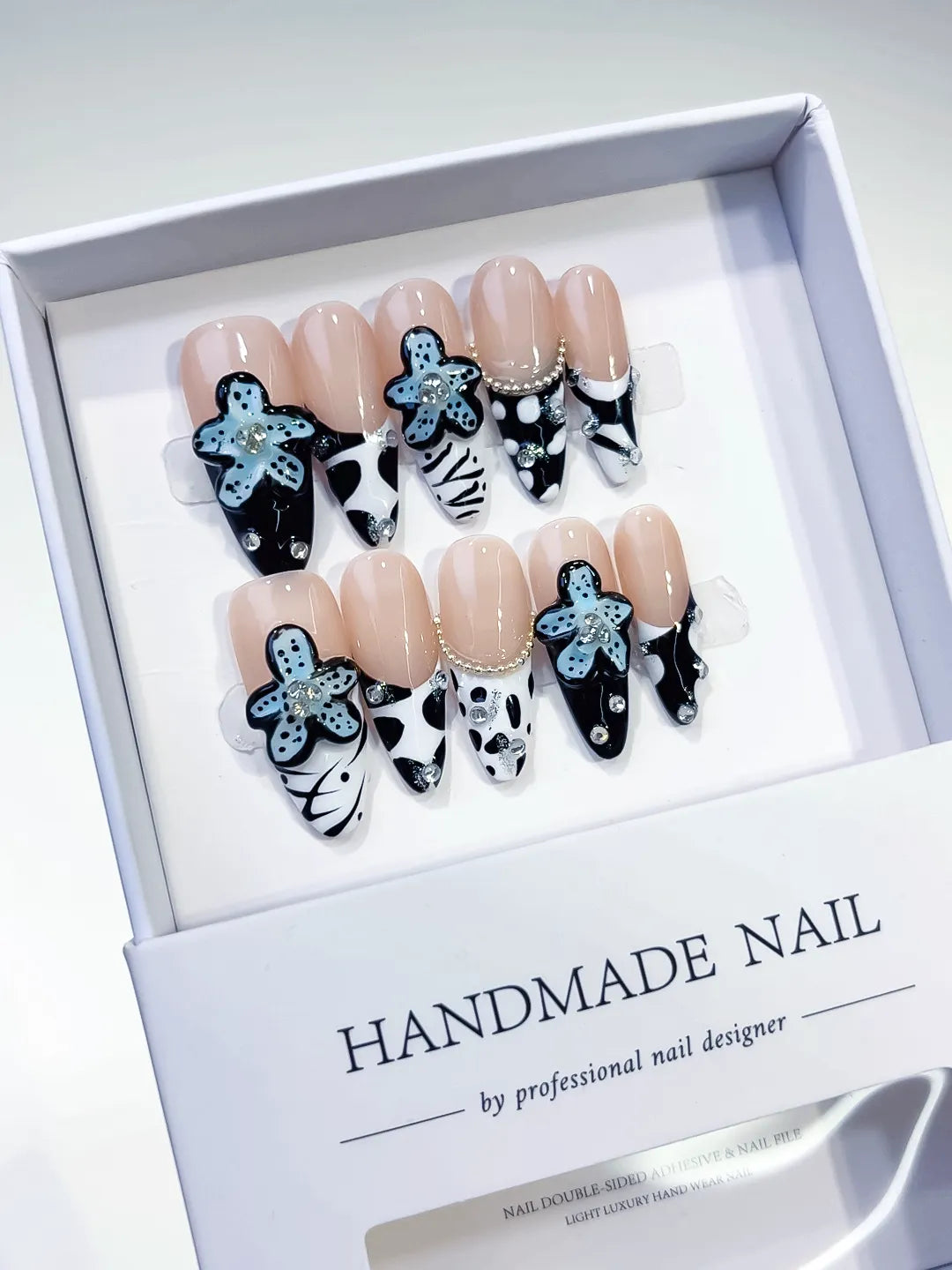 Nude Black White Blue Abstract Flower Pearl press on nails detail view