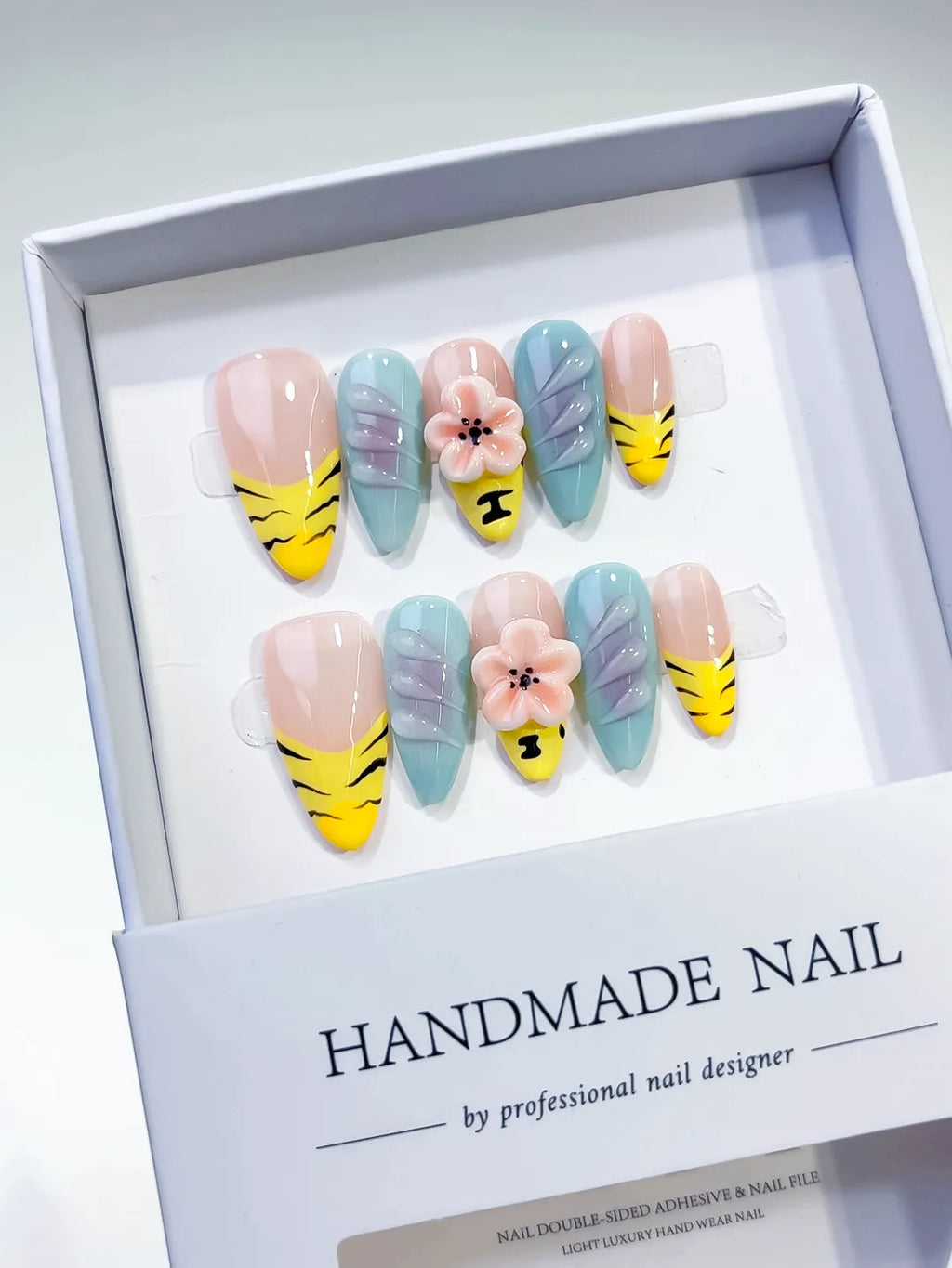 Nude Yellow Green Abstract Flower Leaf press on nails angled view