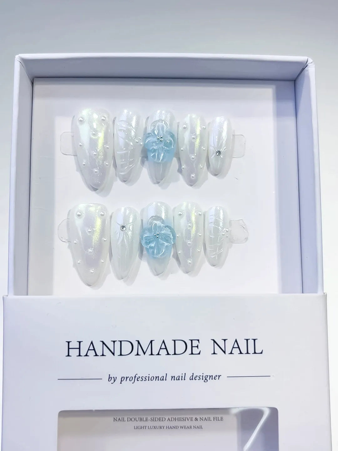 White Blue Silver Holographic Flower Pearl press on nails angled view