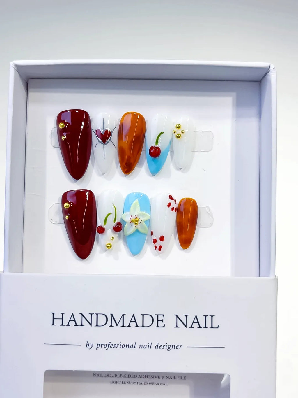 Red Orange Blue White Abstract Cherry Flower Heart press on nails angled view