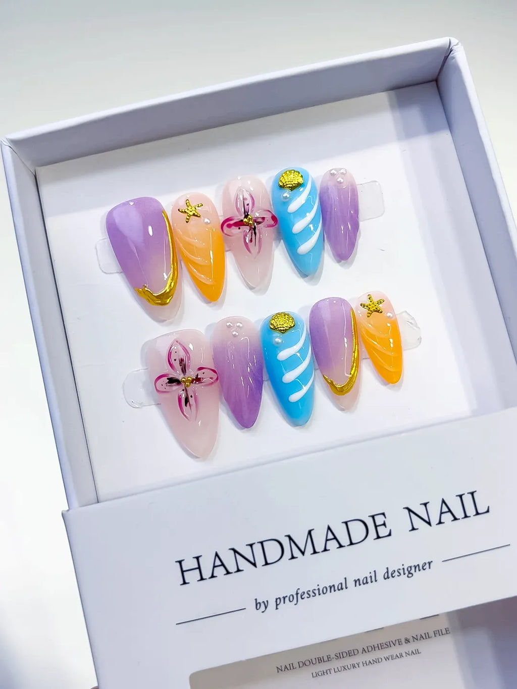 Purple Orange Blue Nude Abstract Flower Star press on nails angled view