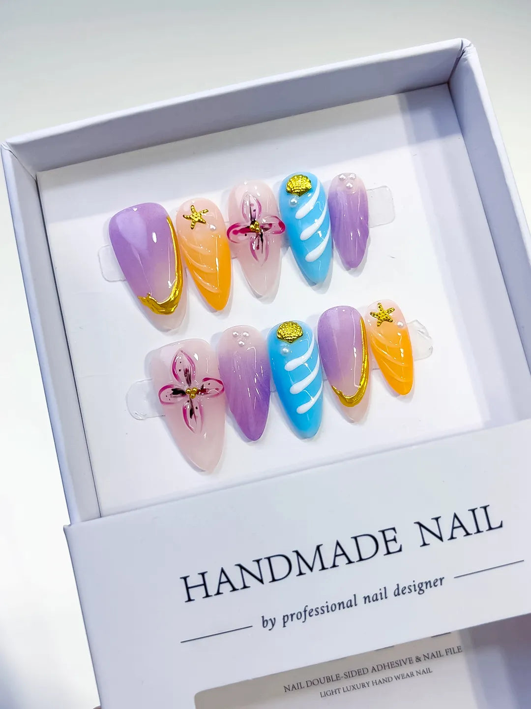 Purple Orange Blue Nude Abstract Flower Star press on nails angled view