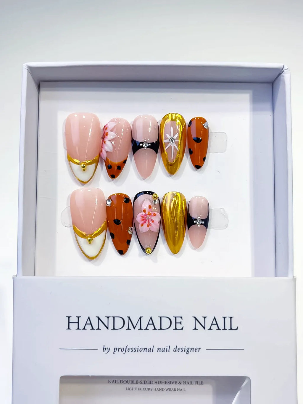 Nude Orange Gold Black Abstract Flower Metallic press on nails detail view
