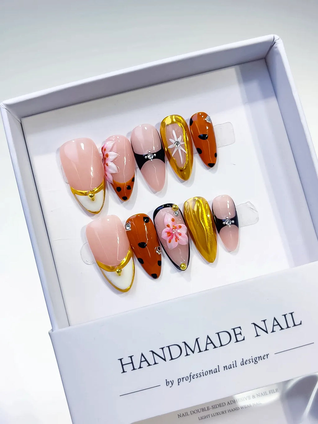 Nude Orange Gold Black Abstract Flower Metallic press on nails detail view