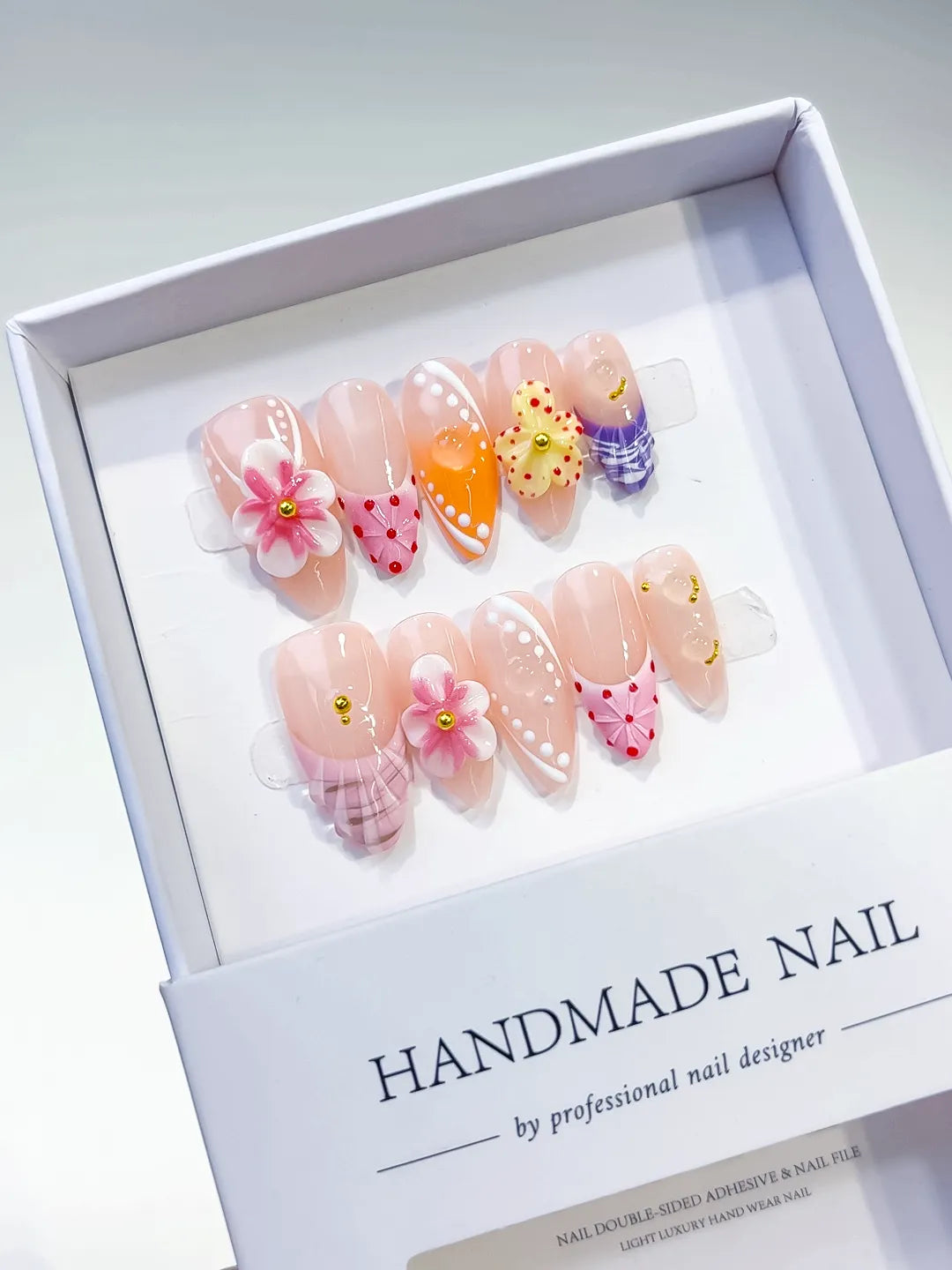 Nude Pink Orange Yellow Purple Abstract Flower Dot Pattern Grid Pattern press on nails angled view