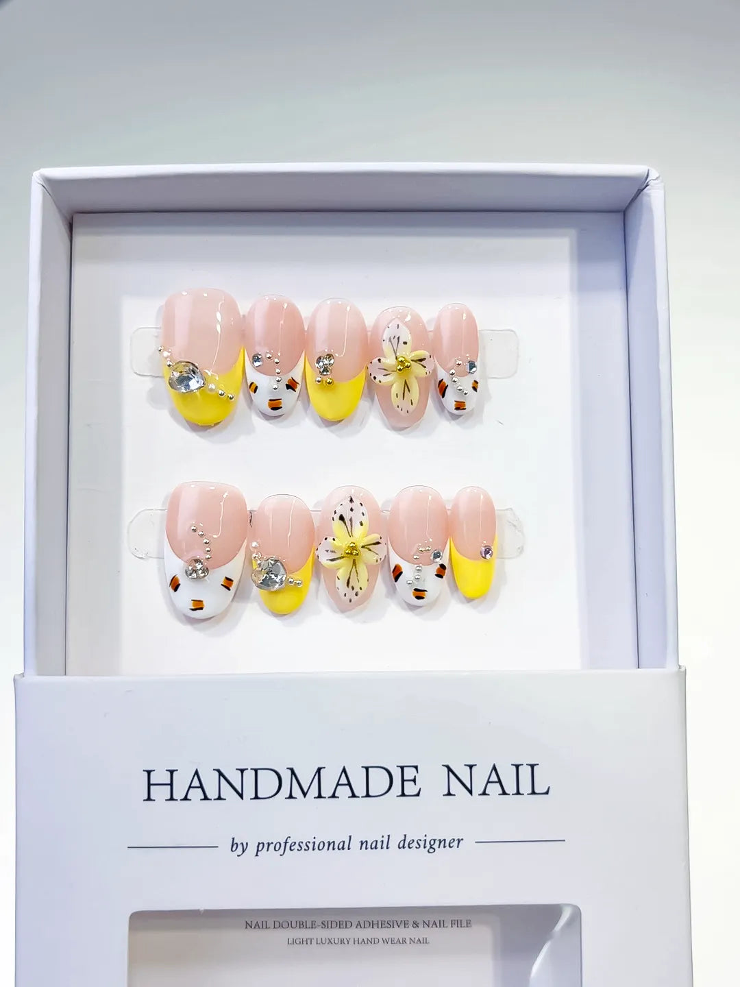 Nude Yellow White French tip Flower Rhinestone press on nails detail view