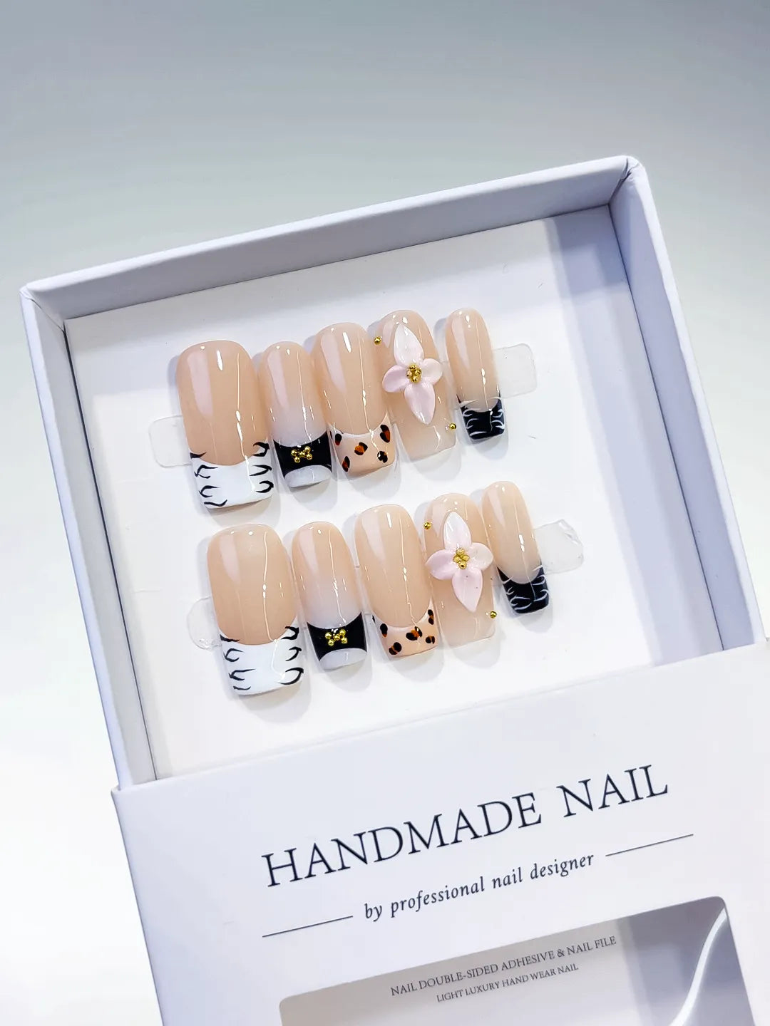Nude White Black French tip Flower Animal Print press on nails angled view