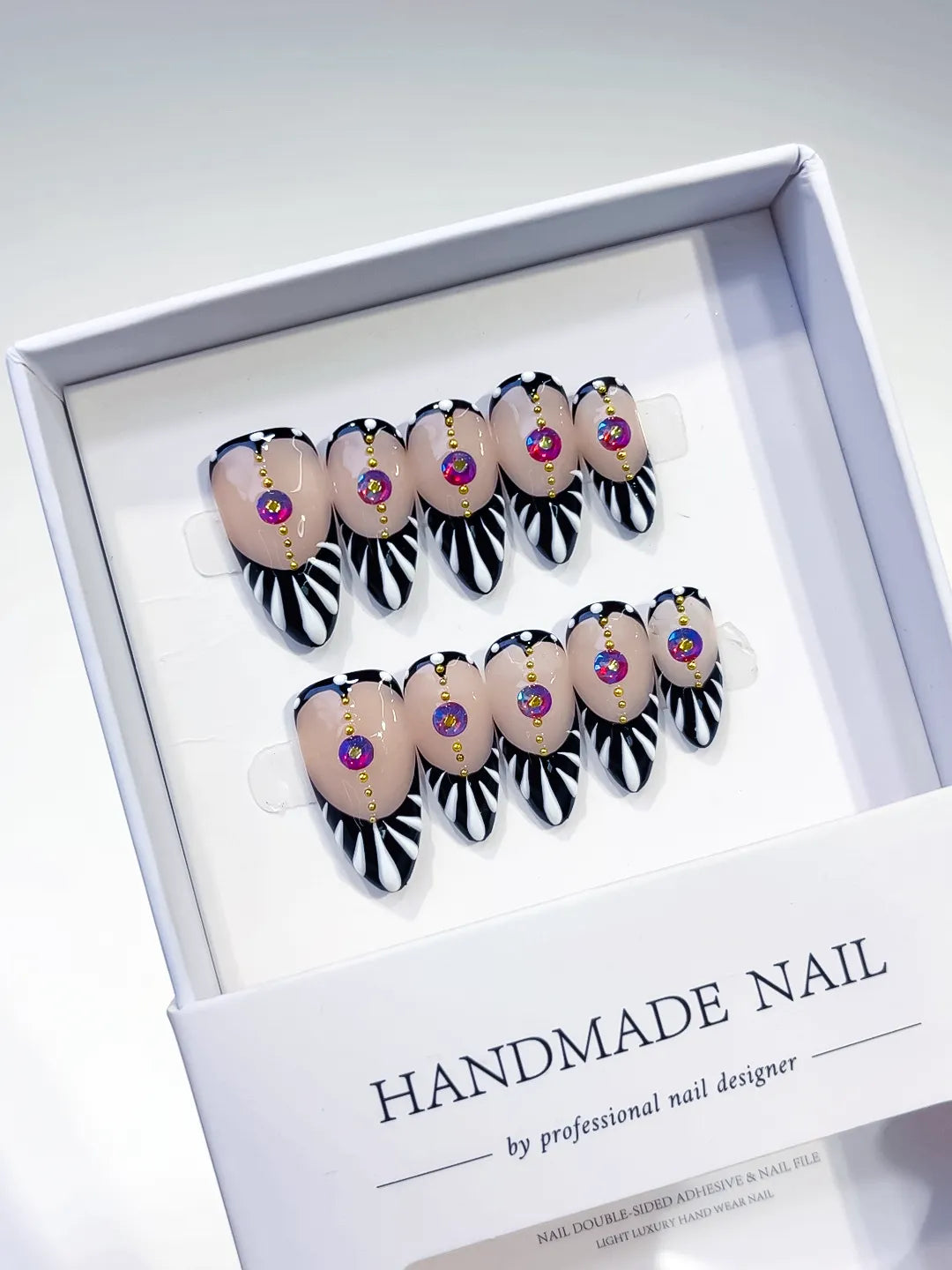 Black White Pink Gold Abstract Stripe Rhinestone press on nails angled view