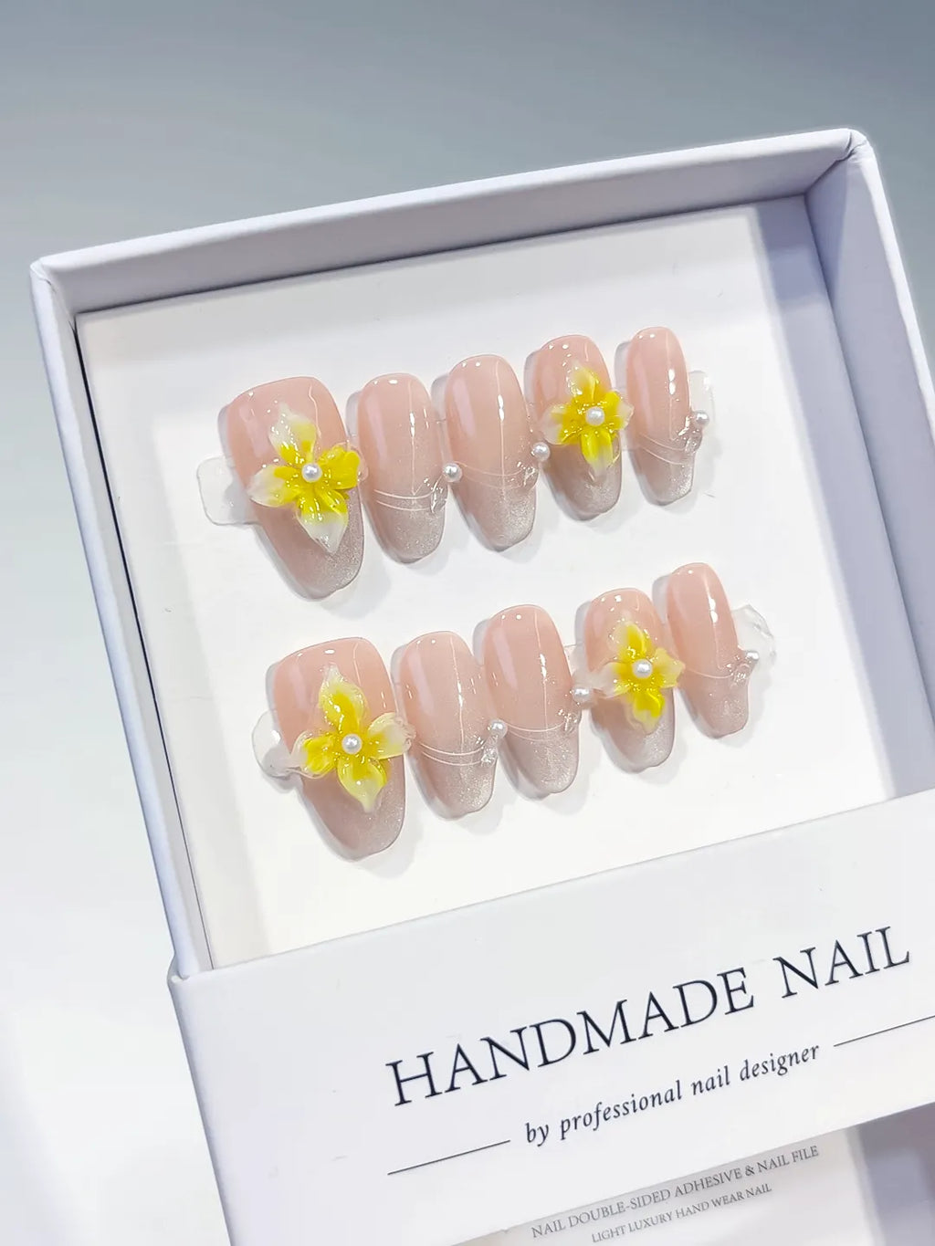 Nude Yellow Solid color Flower Pearl Line press on nails angled view