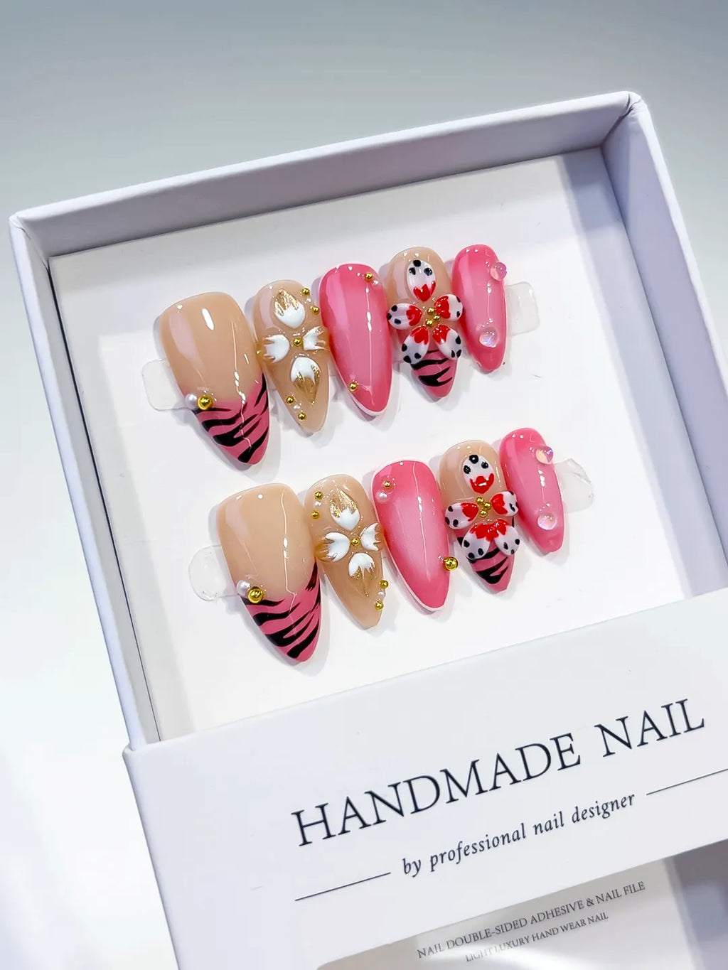 Pink Gold Black Nude Abstract Heart Animal Print Metallic press on nails angled view