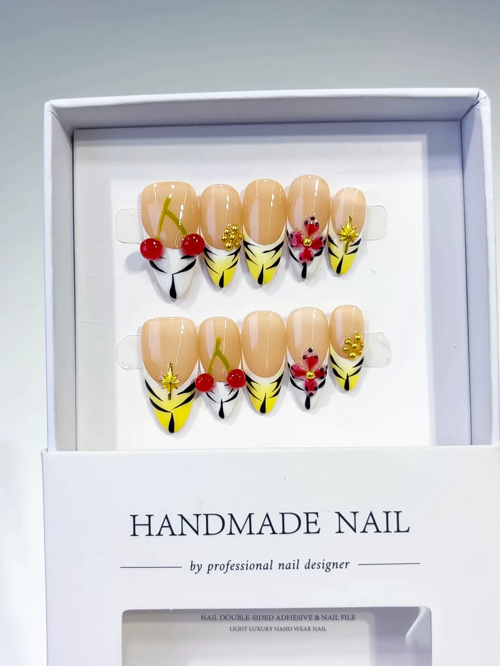 Nude Yellow White French tip Cherry Flower Star press on nails angled view