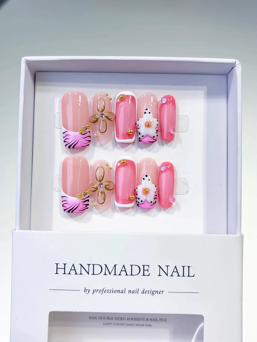 Pink Black Gold Abstract Bow Animal Print Flower press on nails detail view