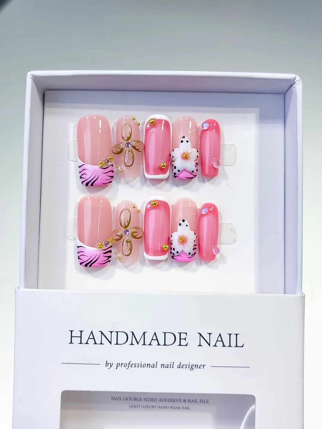 Pink Black Gold Abstract Bow Animal Print Flower press on nails detail view