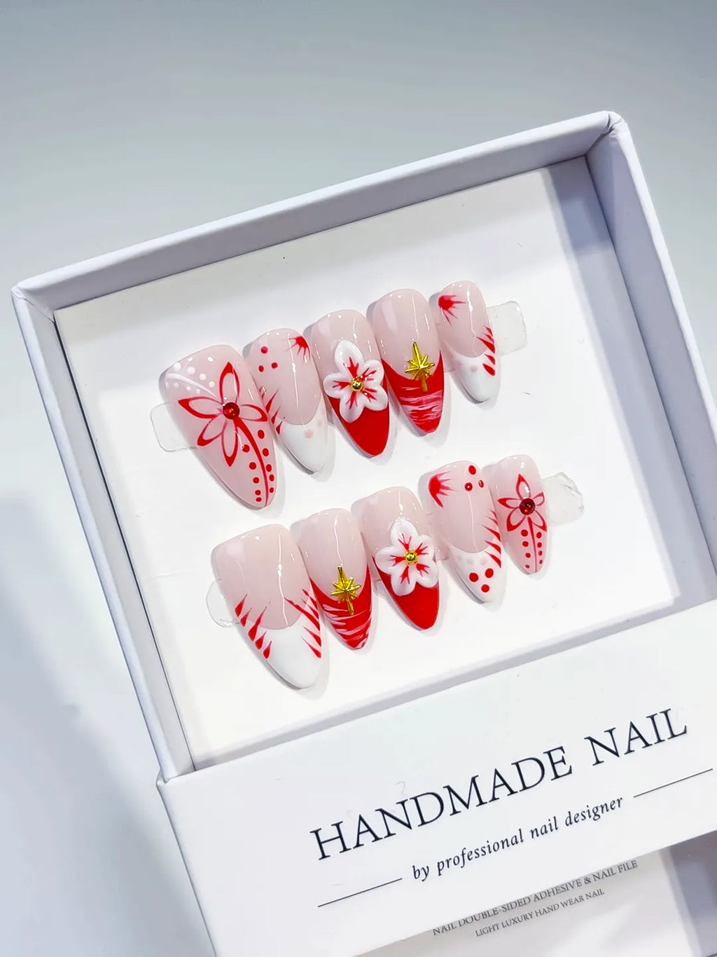 Nude White Red French tip Flower press on nails angled view