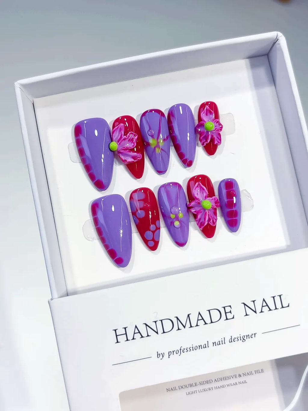 Purple Pink Abstract Flower press on nails angled view