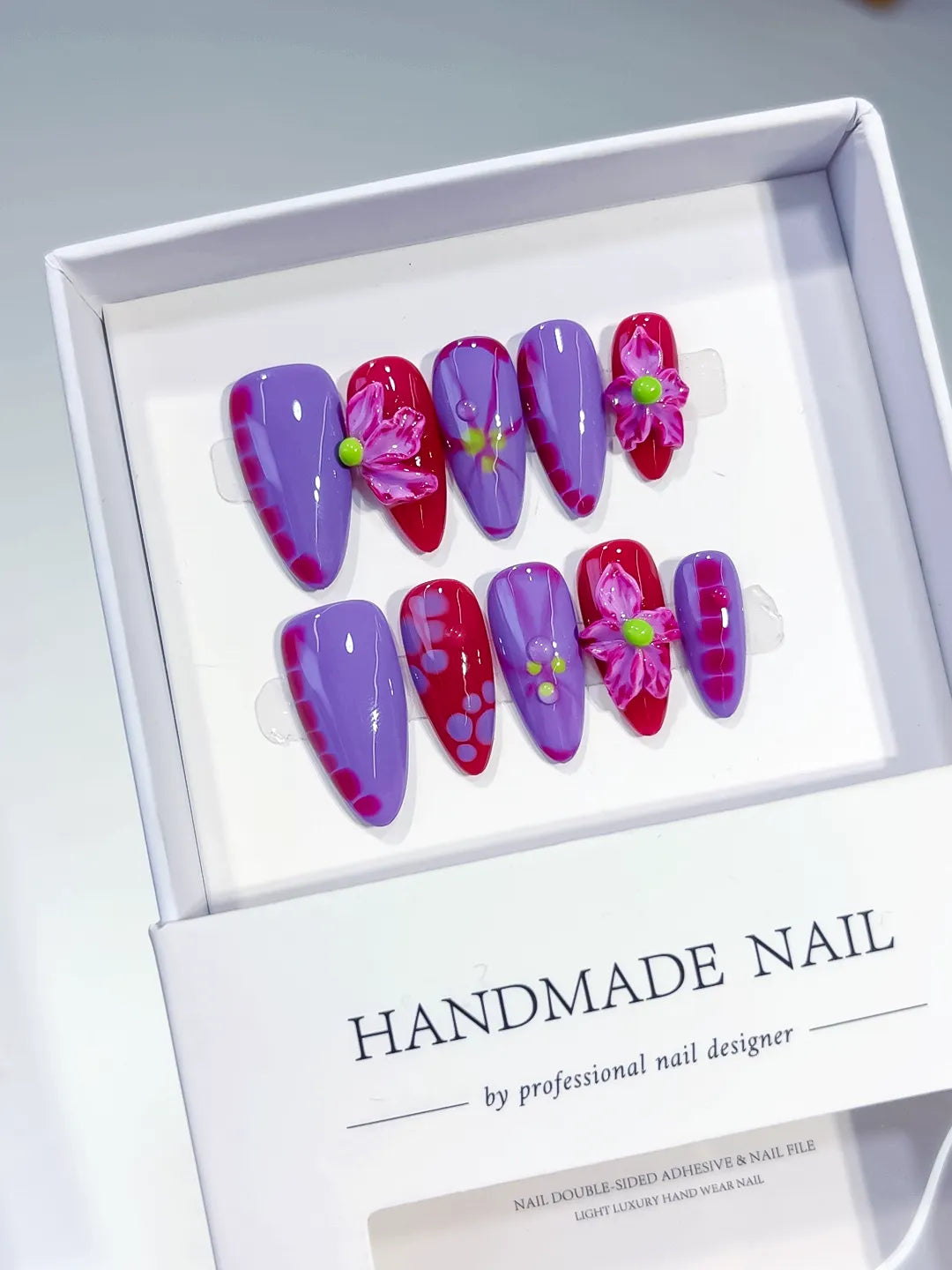 Purple Pink Abstract Flower press on nails angled view