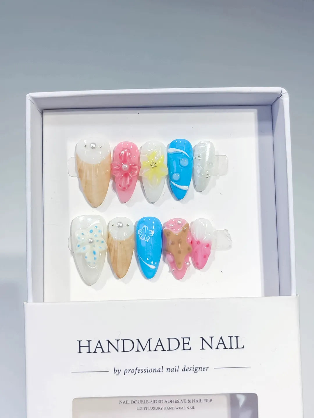 Nude Pink Blue Abstract Flower Cookie Snowflake press on nails full set view