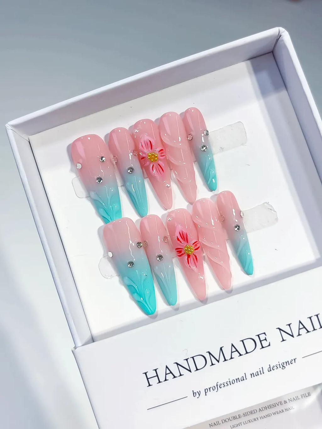Pink Blue Ombre Flower Rhinestone press on nails angled view