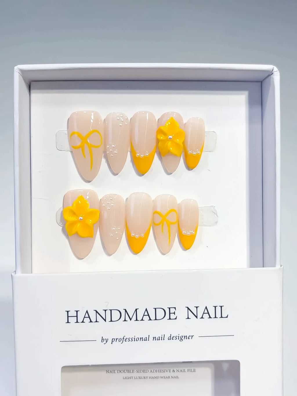 Nude Yellow French tip Flower Bow press on nails full set view