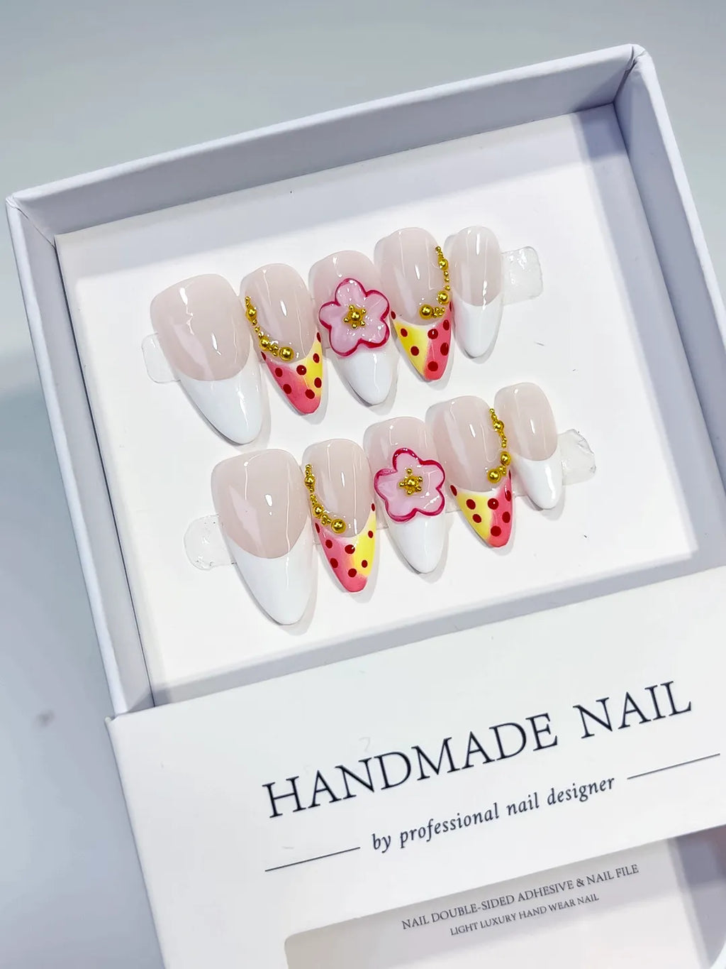 Nude White Yellow Pink French tip Flower Dot Pattern press on nails angled view