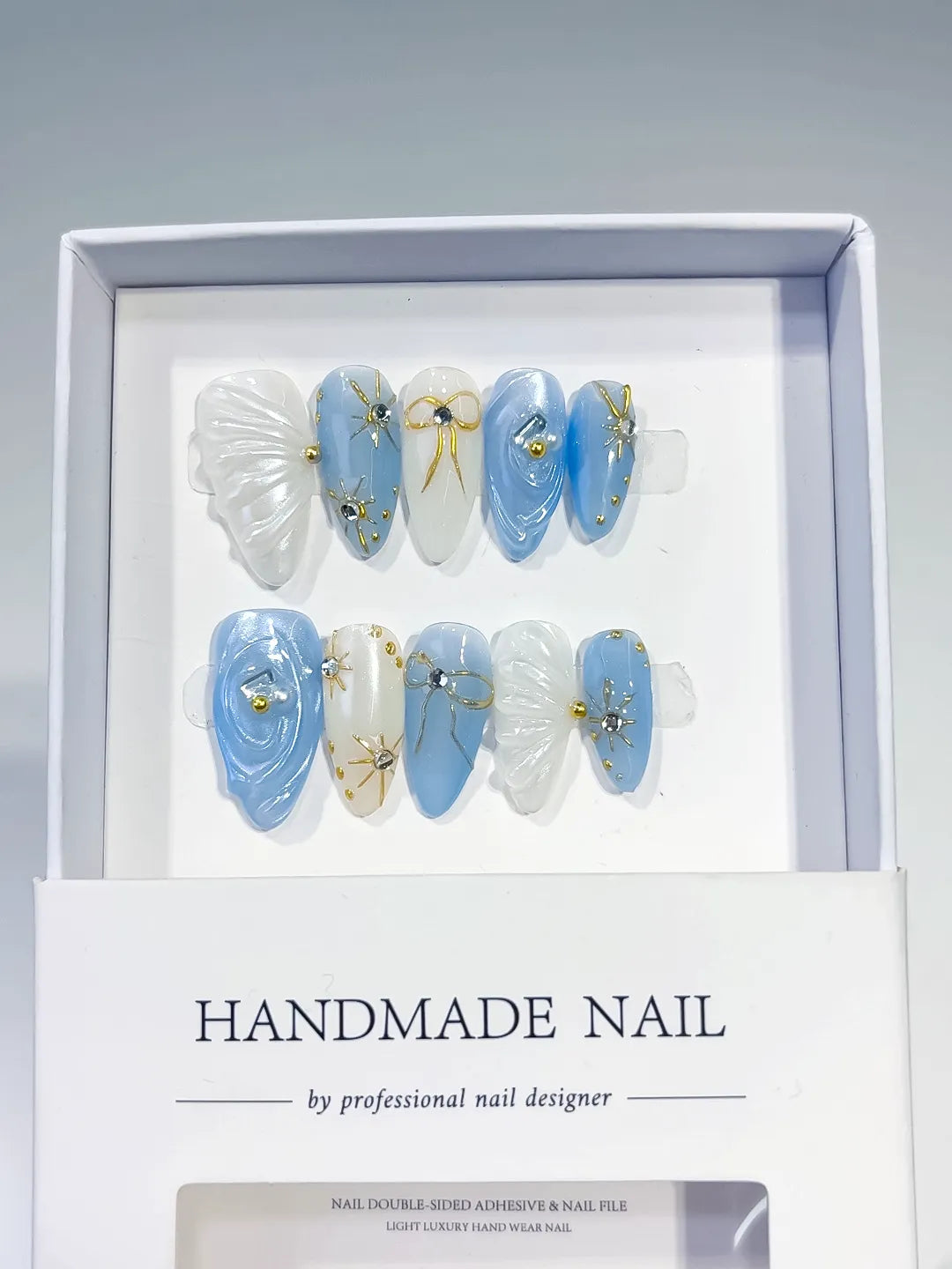 Blue White Holographic Shell Bow Star press on nails full set view