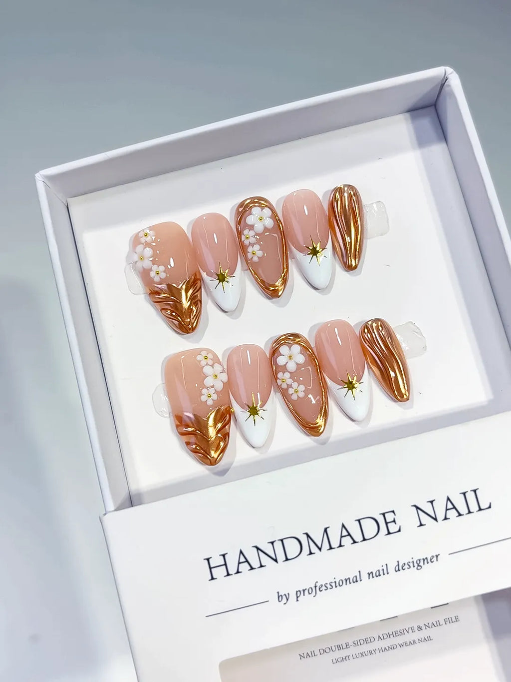Nude Brown White Metallic Flower Star press on nails angled view