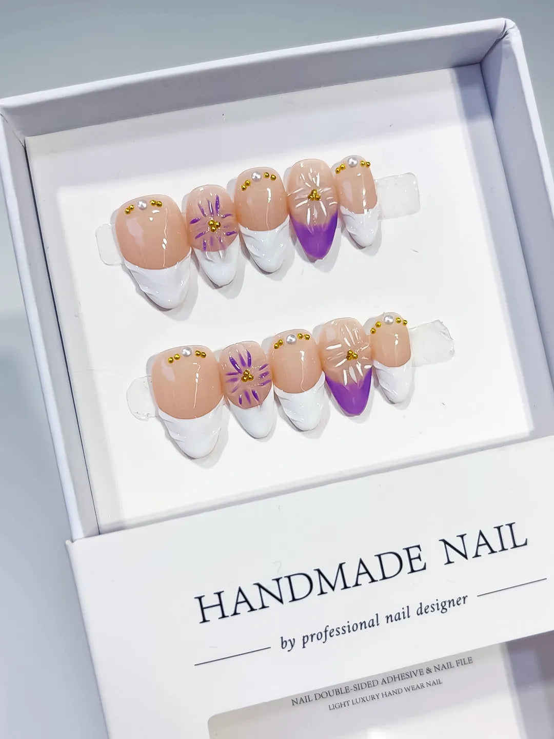 Nude White Purple French tip Flower press on nails angled view