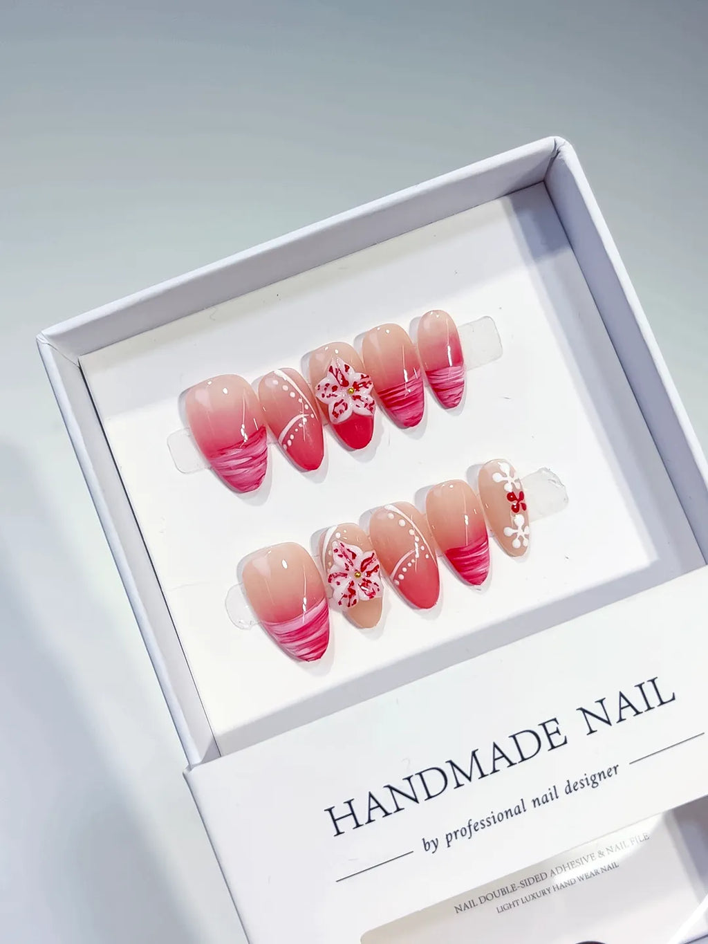 Nude Pink Red French tip Flower press on nails angled view