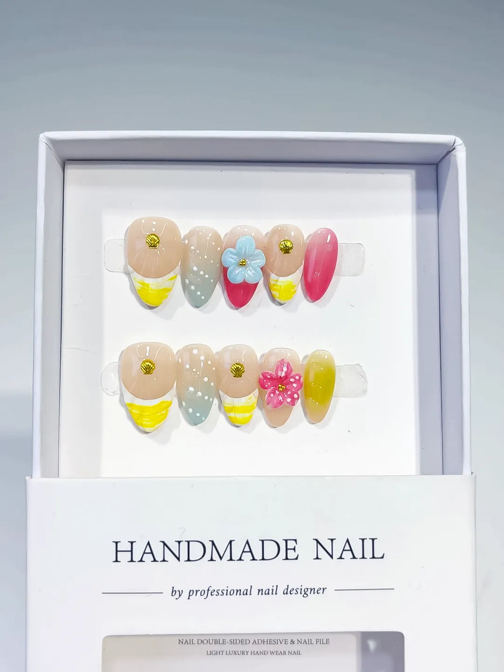 Nude Yellow Pink Green Abstract Flower Shell press on nails angled view