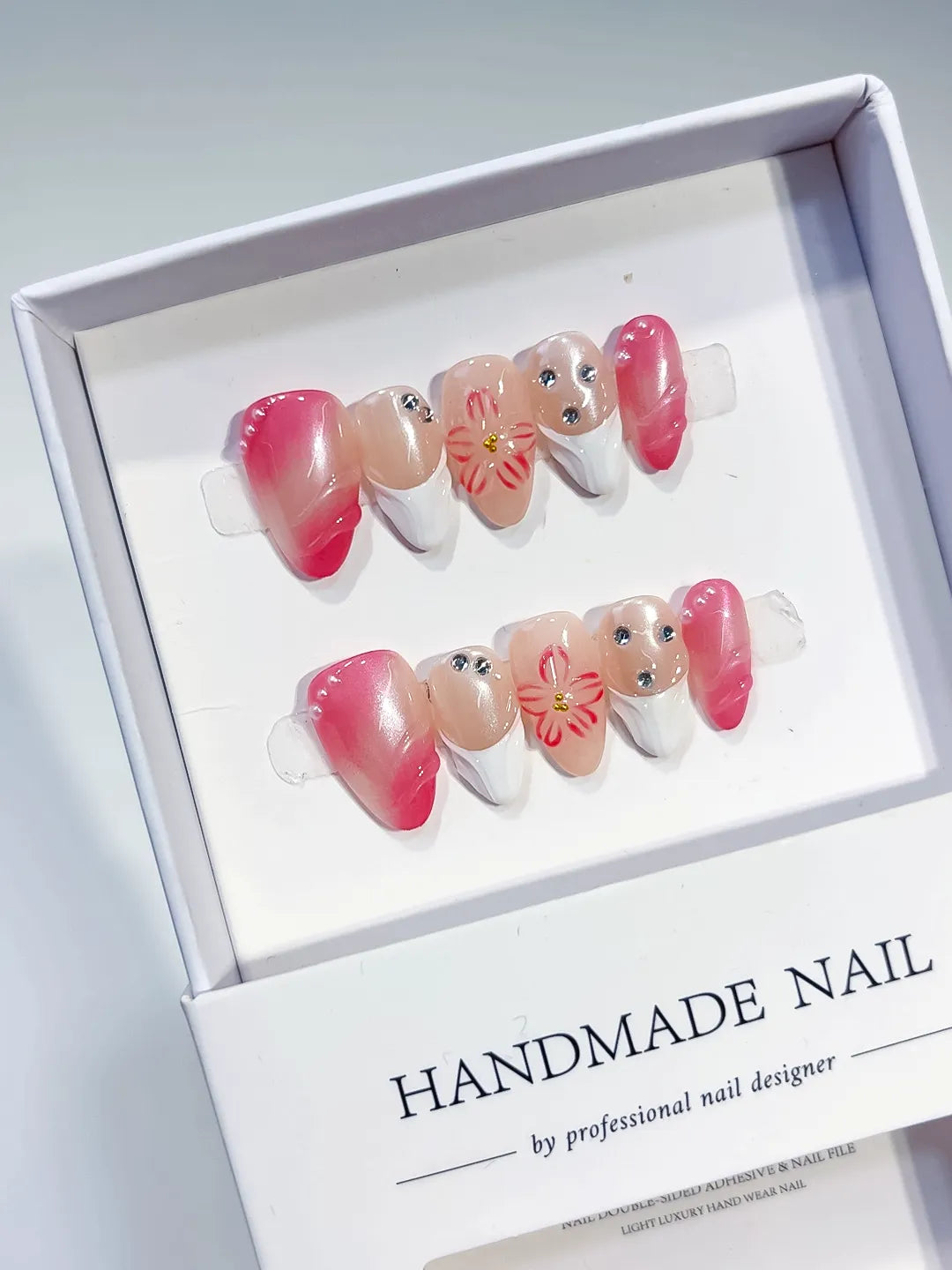 Pink White Nude Ombre Flower Rhinestone press on nails angled view