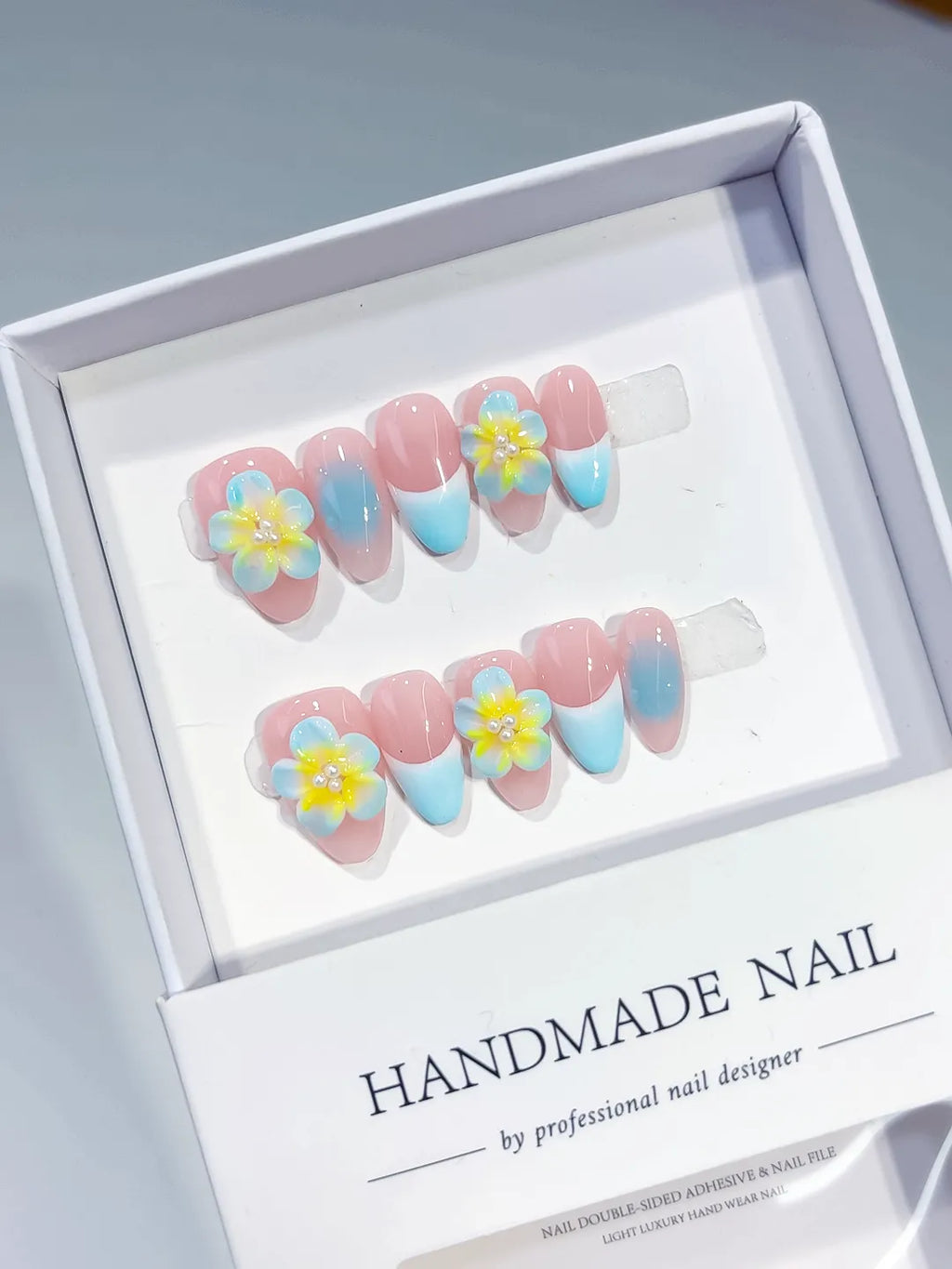 Pink Blue Yellow Ombre Flower press on nails angled view