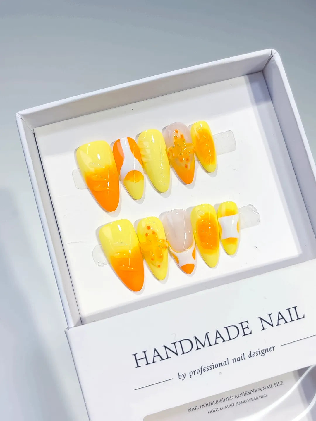 Yellow Orange White Nude Ombre Flower Fruit press on nails angled view