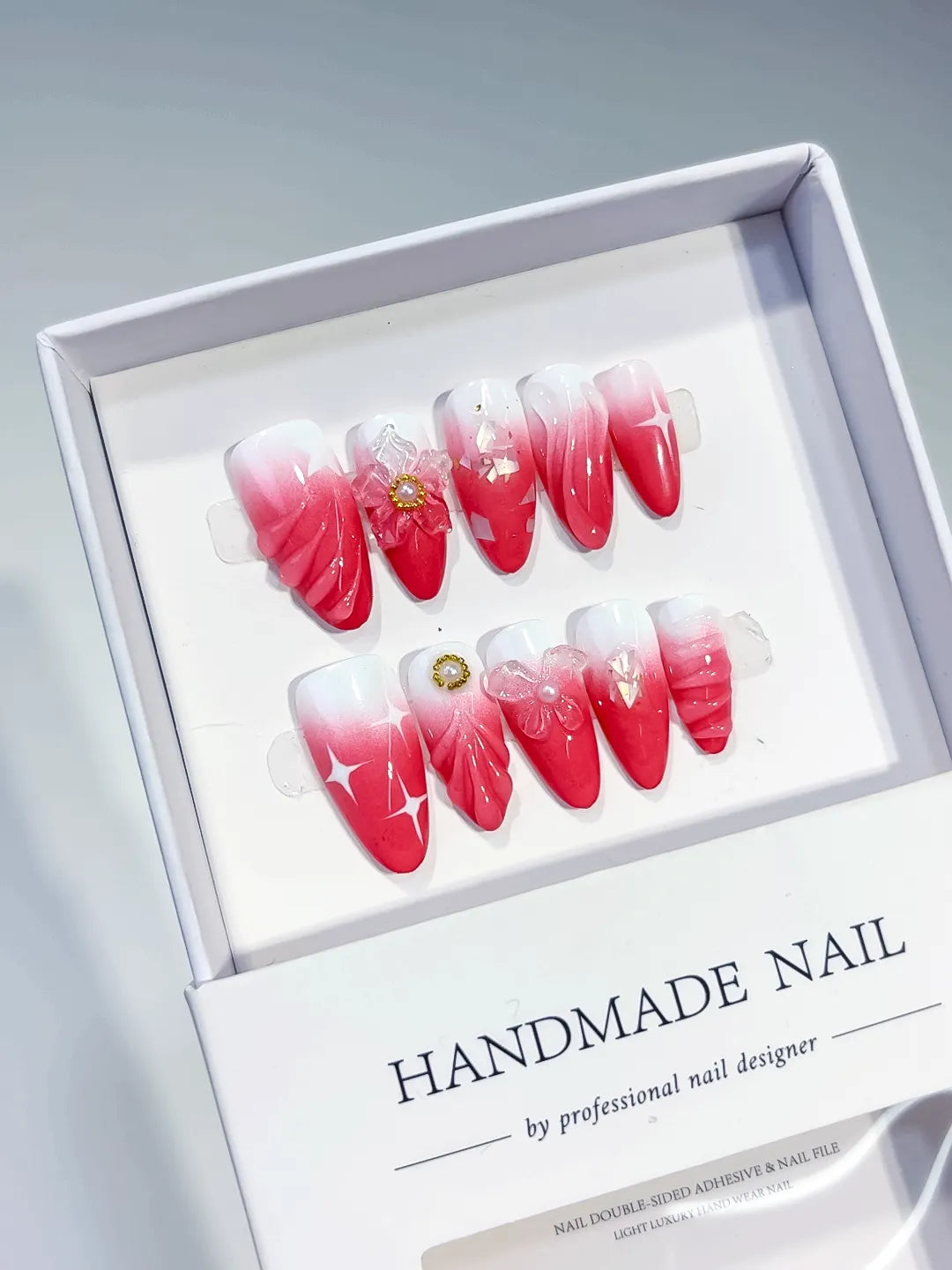 Red White Pink Ombre Flower Bow Star press on nails angled view